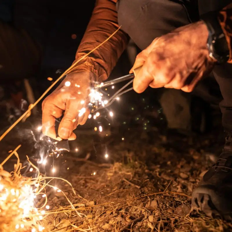 Survival kit with fire starter